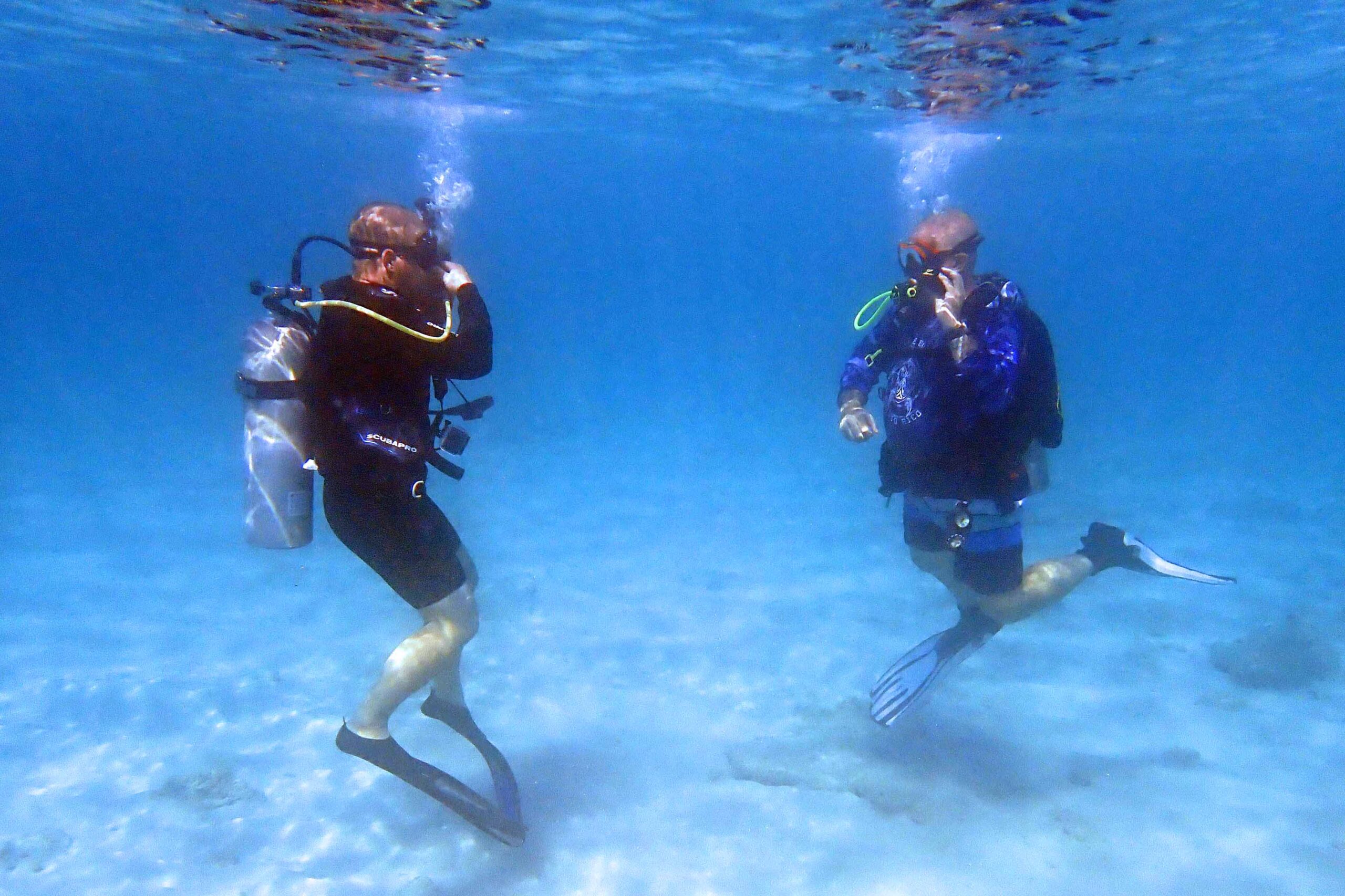 Student diver and instructor in the ocean